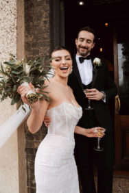 bride holding bouquet at The Angel Hotel